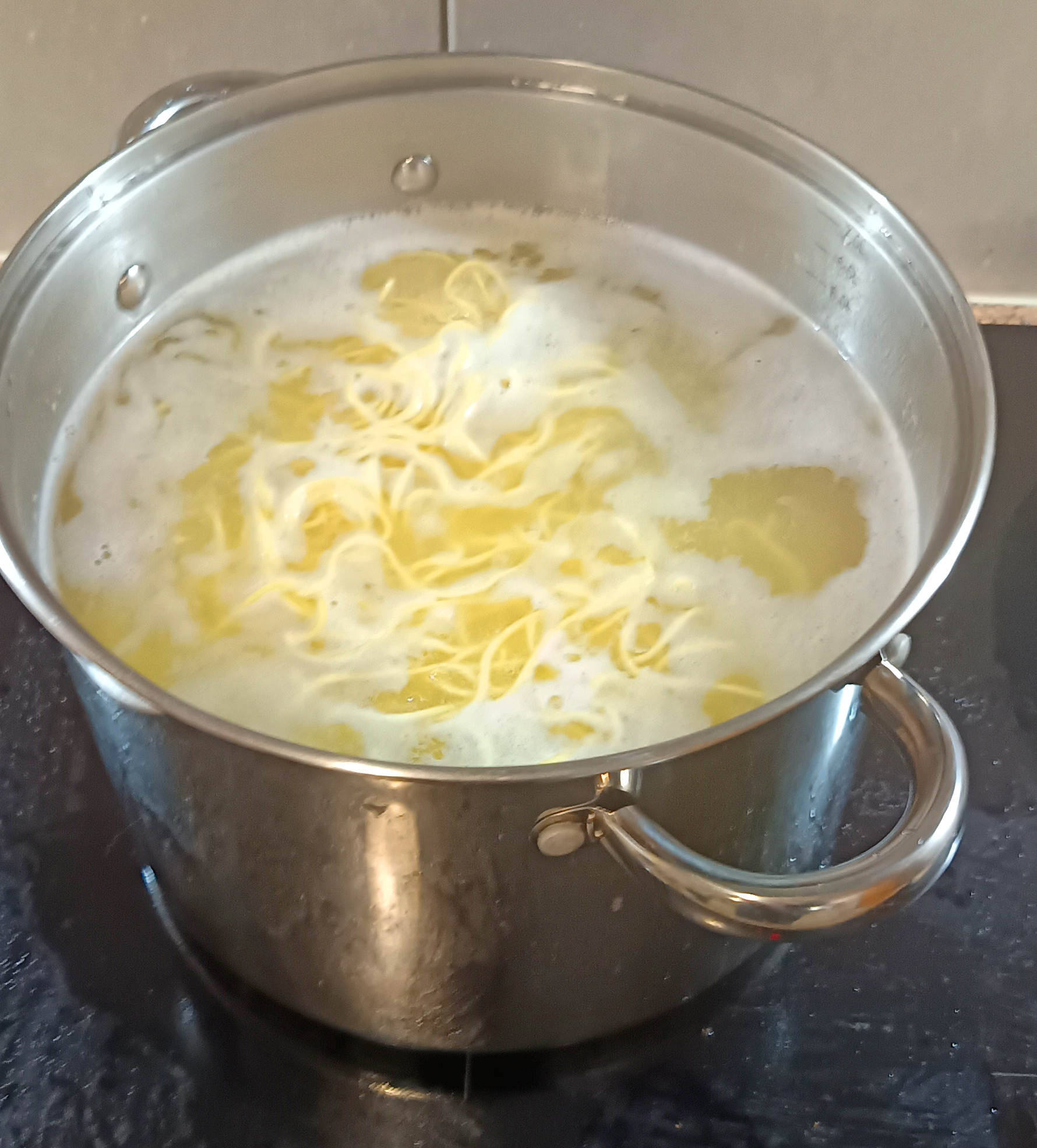 Photo Cooking-noodles-1.jpeg.  Click to redisplay small version of image. https://lemis.nyc3.digitaloceanspaces.com/grog/Photos/20251024/big/Cooking-noodles-1.jpeg