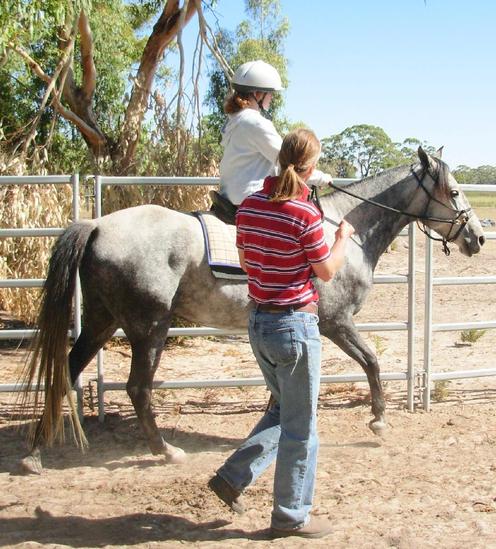 https://lemis.nyc3.digitaloceanspaces.com/yvonne/Photos/20090329/small/riding-Carlos-5.jpeg